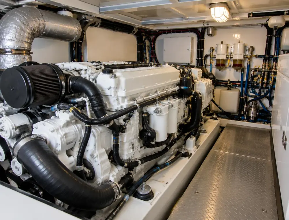 Marine engine room with diesel engine, filters and pipework (illustrative image)